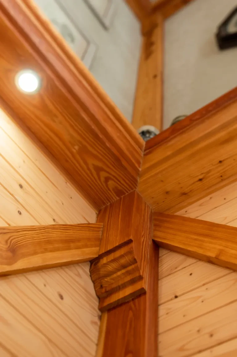 Detailed wooden ceiling with overhead lighting