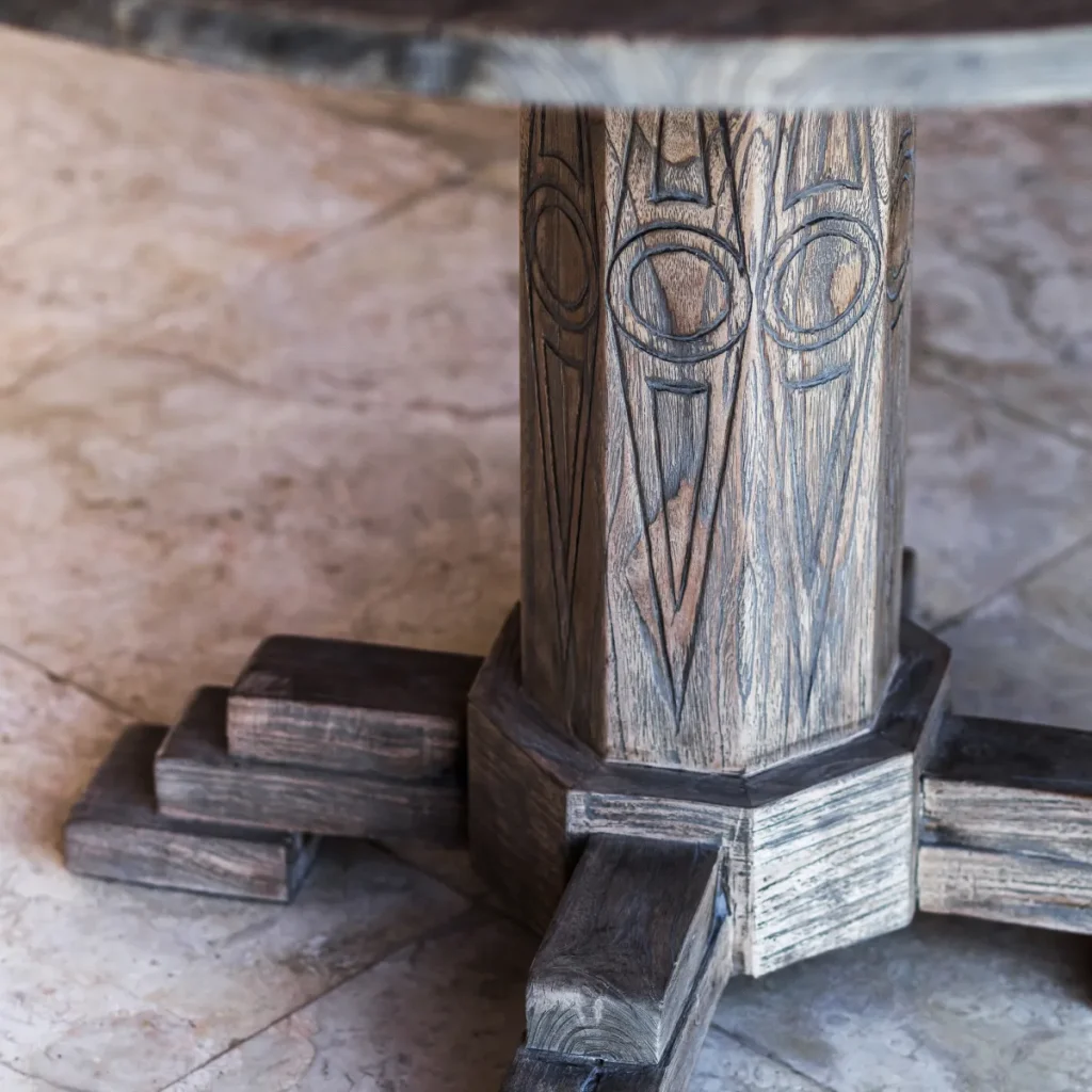 Close up of a carved wooden table base