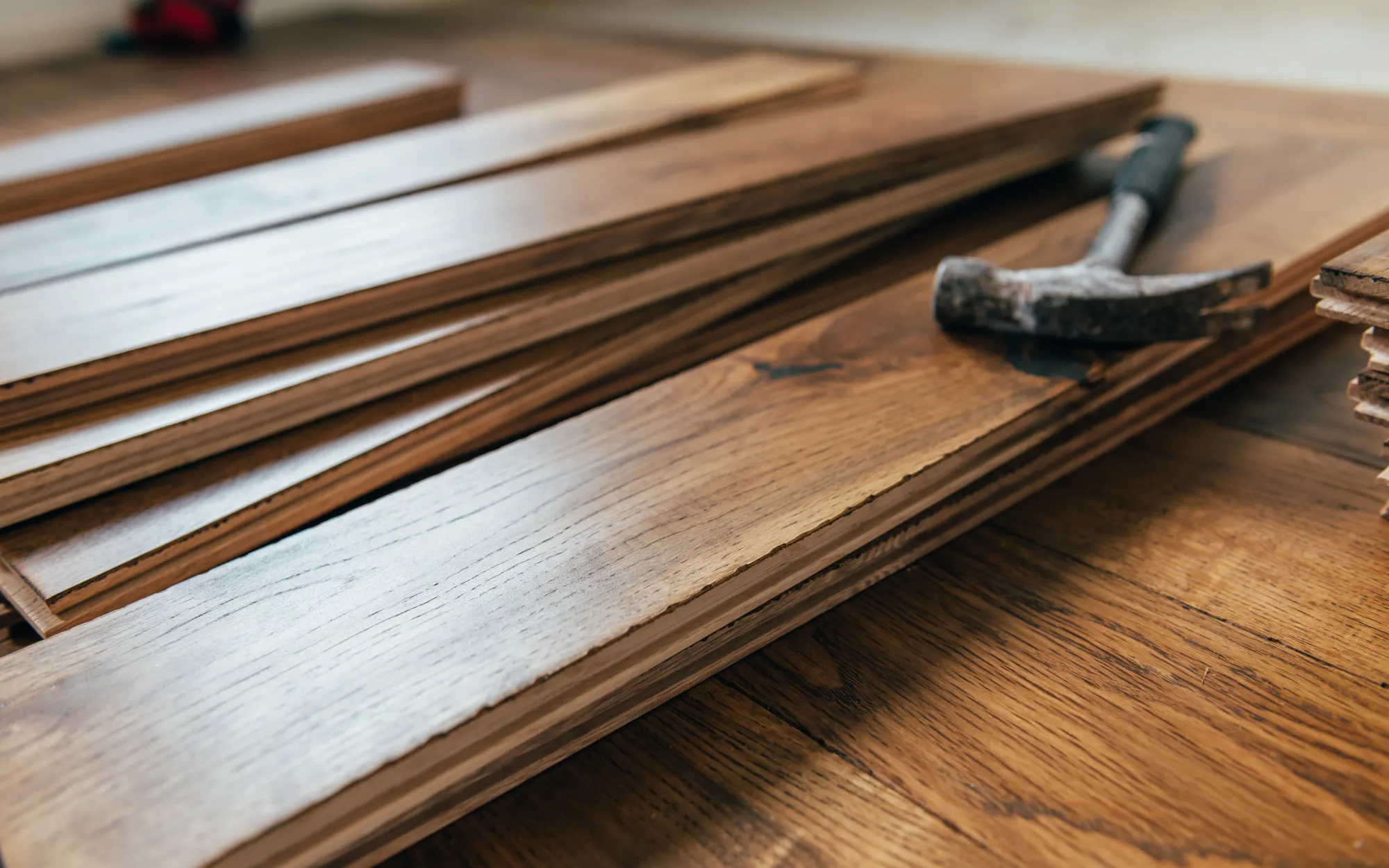 New wooden plank flooring being installed